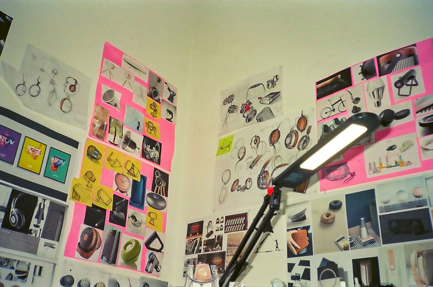 Design studio wall covered in sketches and mood board clippings.